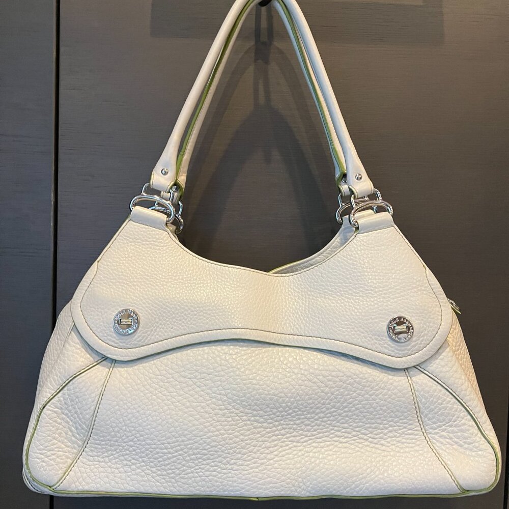 Cole Haan classic tote in cream color with light green trim.